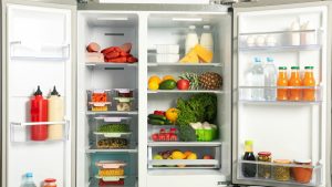 Refrigerator full of food with beeping issue